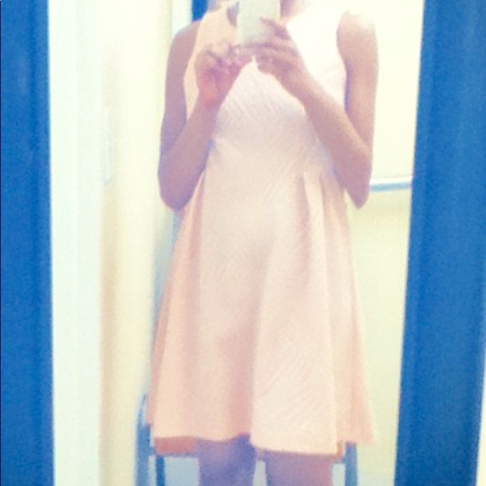 Cute, pink knee length dress.